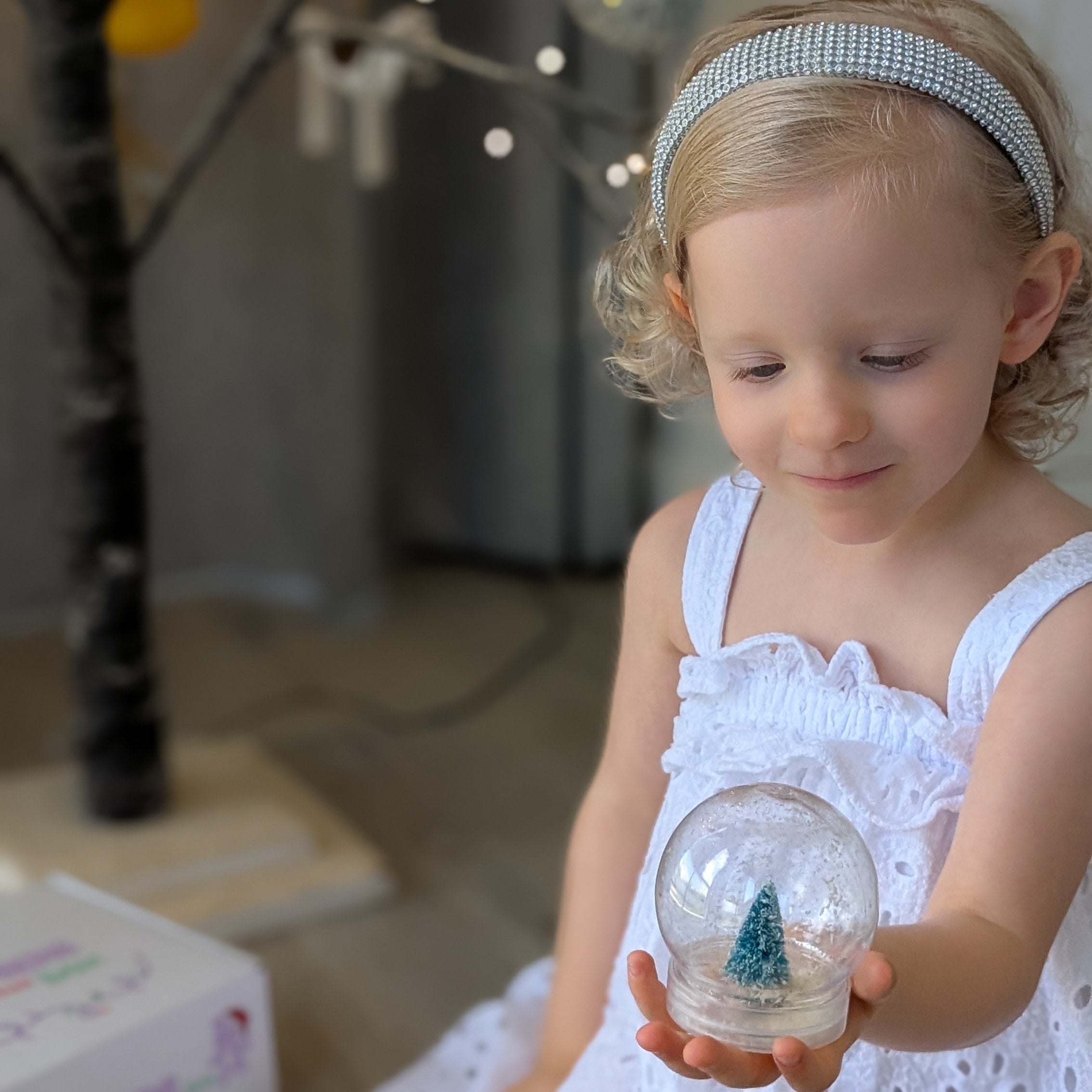 Kids christmas activity craft make a snow globe with taste safe sensory dry mix. 